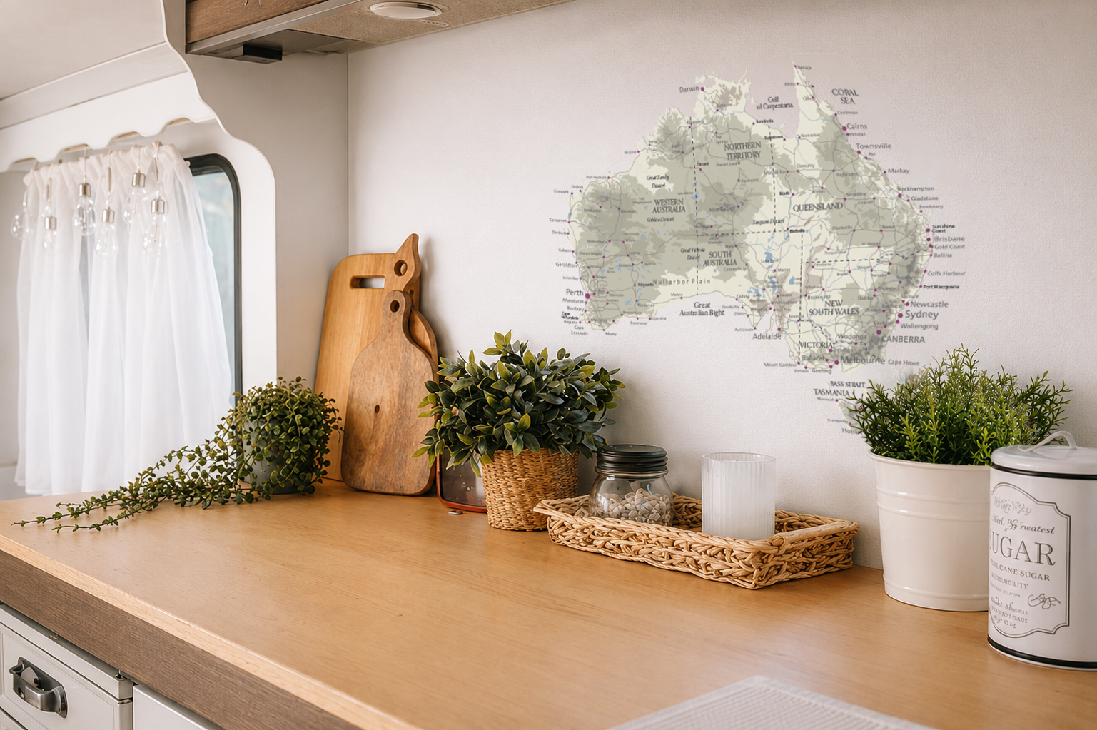 ELZWHERE Trekker map decal on a caravan kitchen wall with rustic styling